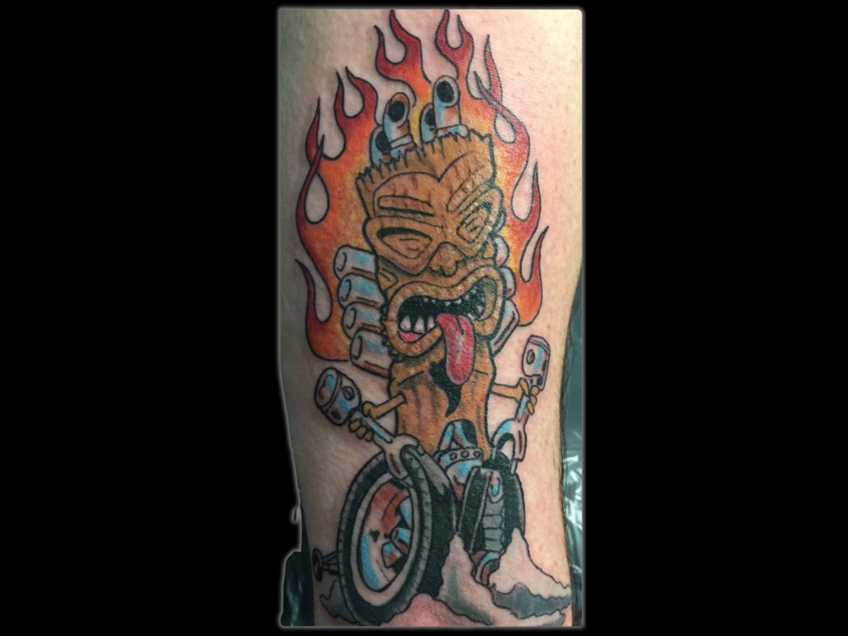 Tiki hot rod tattoo by Byron at Earth's Edge Tattoo & Piercing in Winston-Salem
