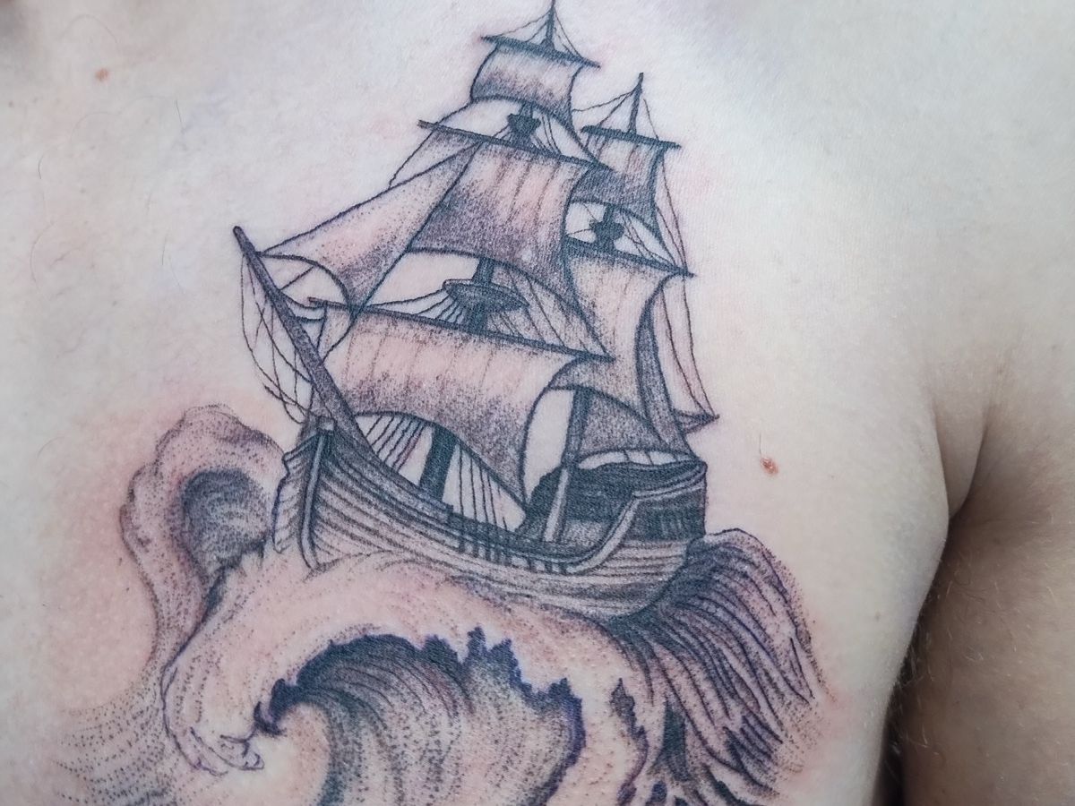 Ship and waves tattoo by Courtney at Earth’s Edge Tattoo & Piercing