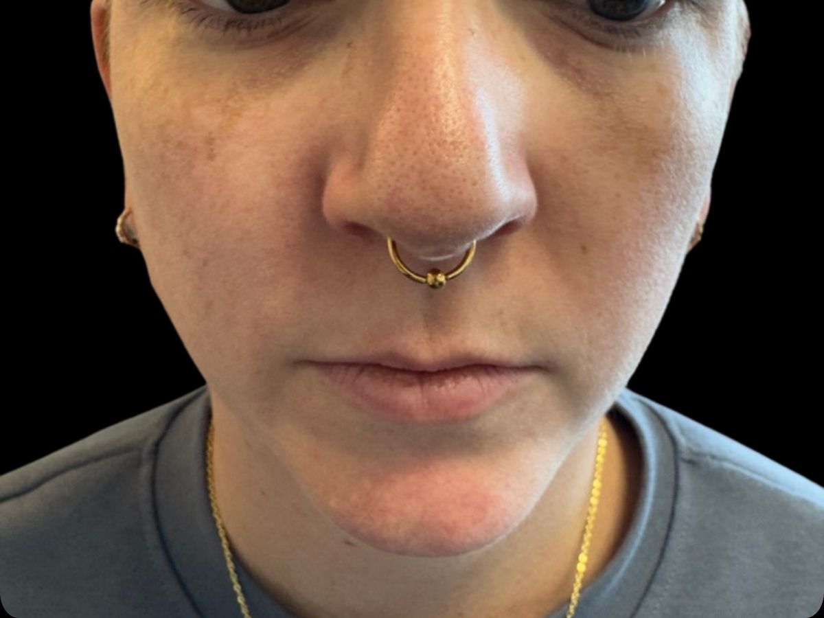 Gold septum piercing by Josh at Earth’s Edge in Winston‑Salem, NC