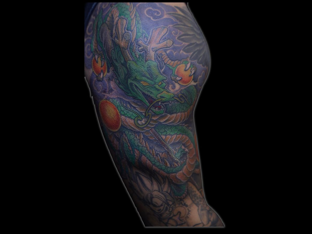 Japanese dragon tattoo by Nico at Earth’s Edge Tattoo & Piercing in Winston-Salem, NC