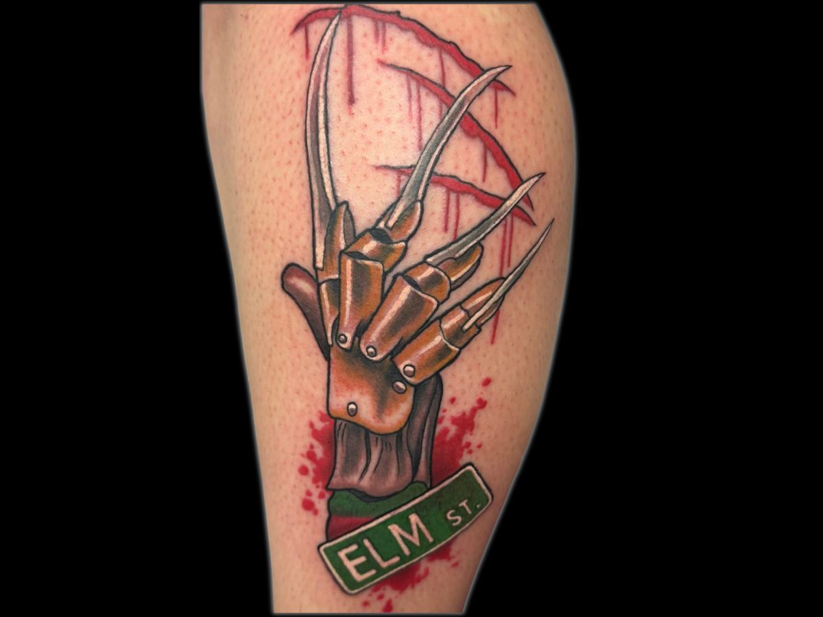 Freddy Krueger inspired hand tattoo by Robert — horror realism with texture.